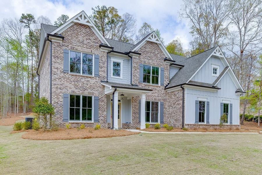 Front exterior of a new home in , Bishop, GA, highlighting curb appeal (Image 2). Front exterior of a new home in , Bishop, GA, highlighting curb appeal (Image 2).