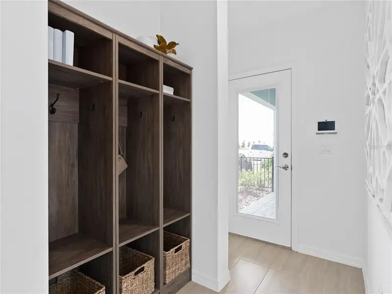 Furnished interior view inside a new home in EverBe, Orlando (Image 31).