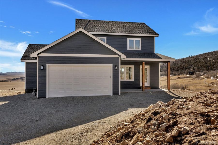 Front exterior of a new home in , Fairplay, CO, highlighting curb appeal (Image 1). Front exterior of a new home in , Fairplay, CO, highlighting curb appeal (Image 1).