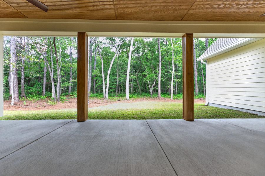 Exterior details and patio area of a home in , Johns Island (Image 28).
