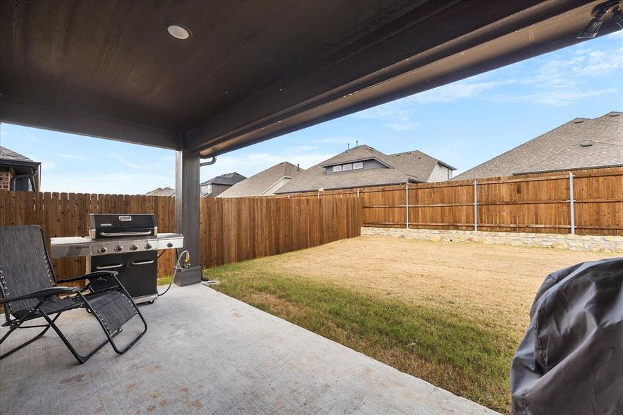 Exterior details and patio area of a home in Sonoma Verde, McLendon-Chisholm (Image 3).
