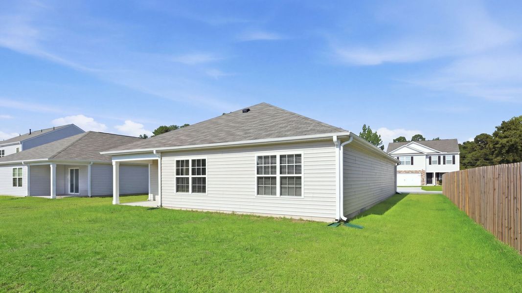 Exterior details and patio area of a home in Madeline Farm, New Bern (Image 4).