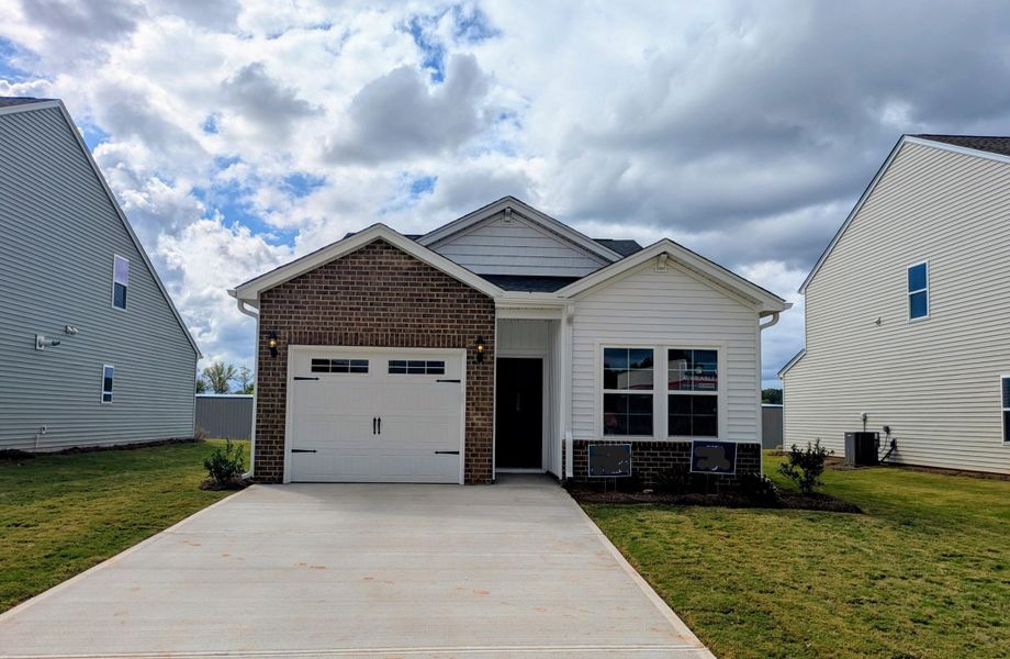 Front exterior of a new home in Tucker Ridge, Pendleton, SC, highlighting curb appeal (Image 1). Front exterior of a new home in Tucker Ridge, Pendleton, SC, highlighting curb appeal (Image 1).