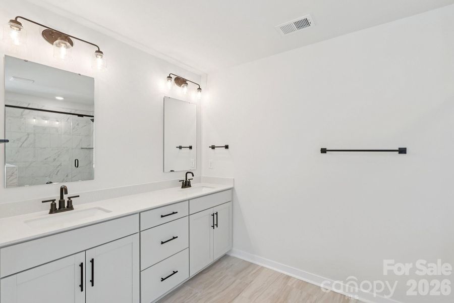 Furnished interior view inside a new home in Oak Grove Hill, Huntersville (Image 18). Furnished interior view inside a new home in Oak Grove Hill, Huntersville (Image 18).