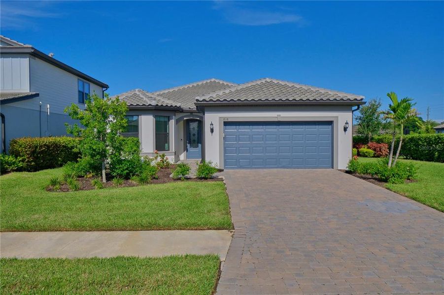Front exterior of a new home in , Bradenton, FL, highlighting curb appeal (Image 1). Front exterior of a new home in , Bradenton, FL, highlighting curb appeal (Image 1).