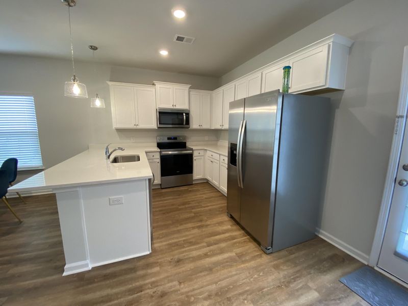 Furnished interior view inside a new home in , Summerville (Image 10).
