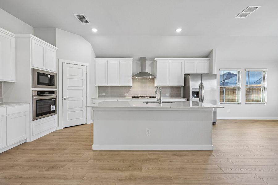 Kitchen in the Gilmour II home plan by Trophy Signature Homes