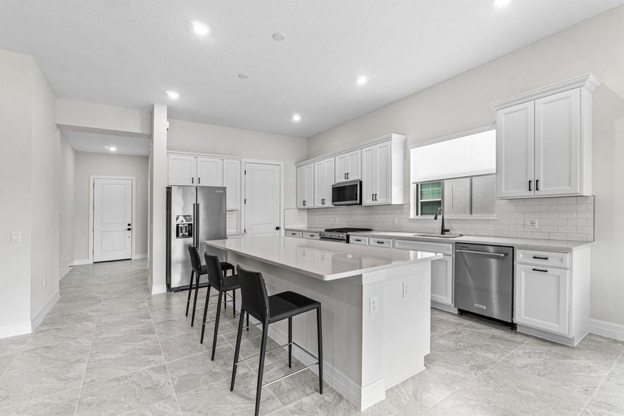Furnished interior view inside a new home in Avondale at Avenir, Palm Beach Gardens (Image 48).