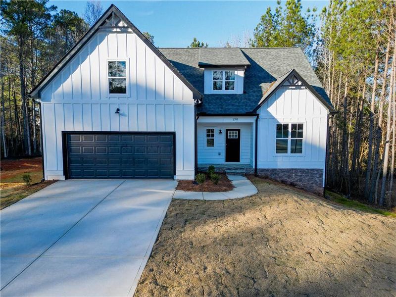 Front exterior of a new home in , Villa Rica, GA, highlighting curb appeal (Image 21).