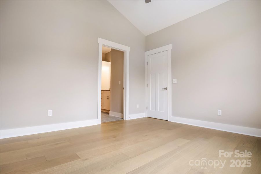 2nd bedroom with vaulted ceiling on the main floor.