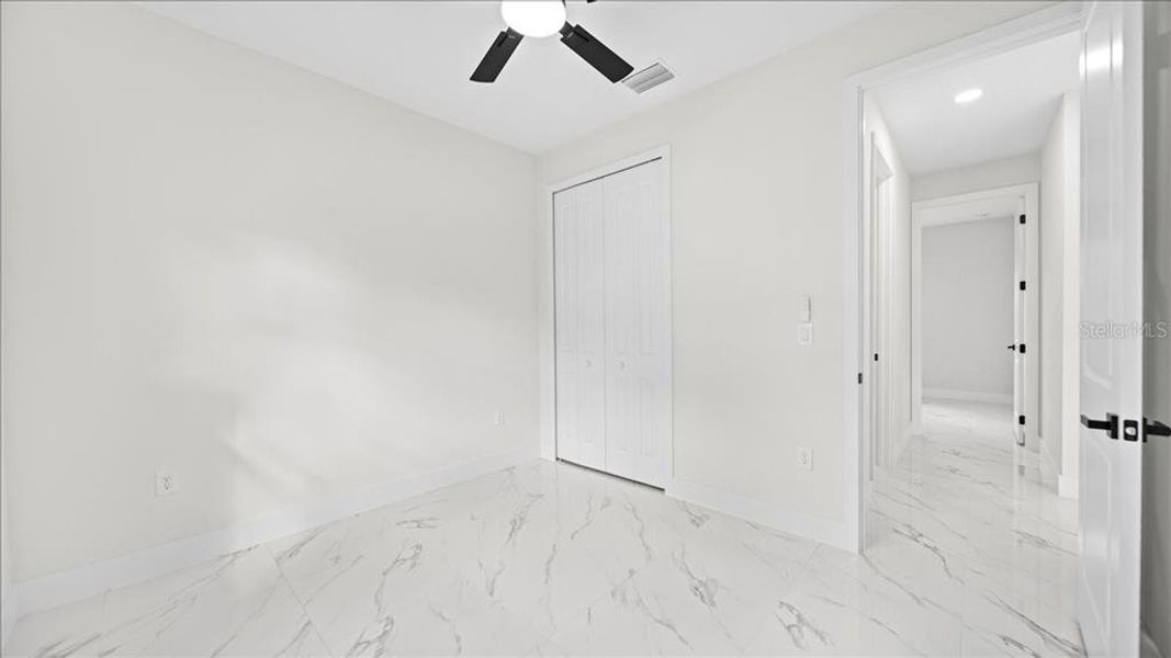Spacious, unfurnished interior of a new home in , Port Charlotte (Image 16).