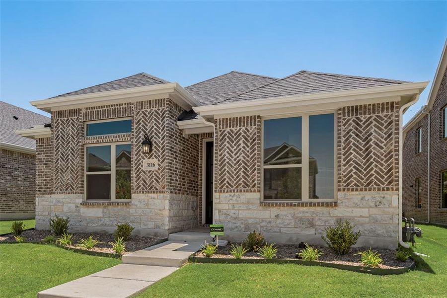 Front exterior of a new home in Arbors at Legacy Hills, Celina, TX, highlighting curb appeal (Image 16). Front exterior of a new home in Arbors at Legacy Hills, Celina, TX, highlighting curb appeal (Image 16).