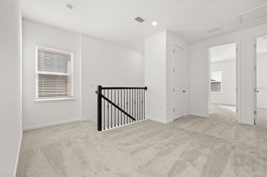 Spacious, unfurnished interior of a new home in Serenade at Ovation, Winter Garden (Image 21).