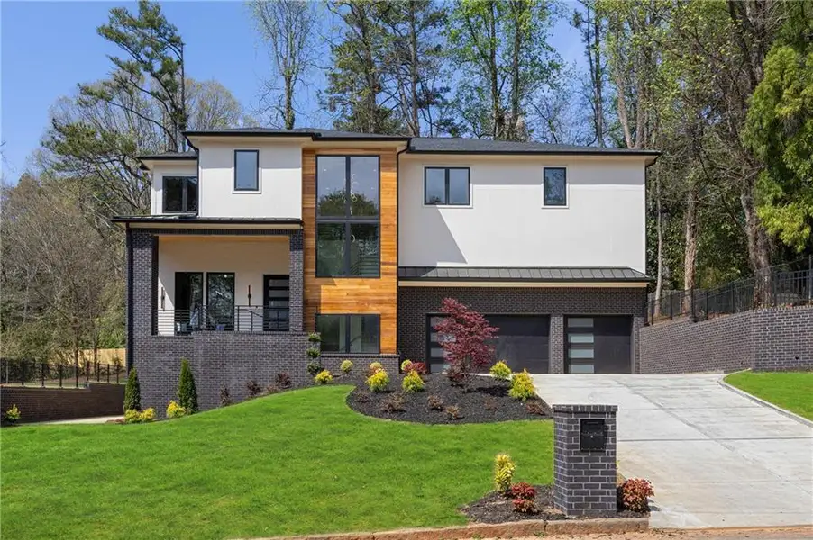 Front exterior of a new home in , Sandy Springs, GA, highlighting curb appeal (Image 30).