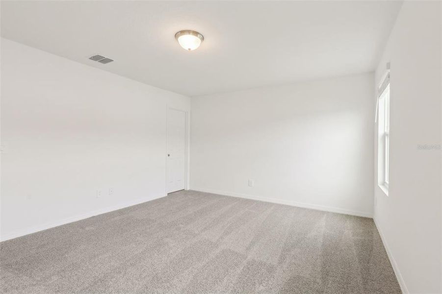 Spacious, unfurnished interior of a new home in The Meadow at Crossprairie Townes, St. Cloud (Image 17).