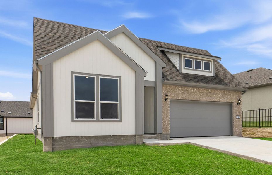 Front exterior of a new home in Sun City Texas, Georgetown, TX, highlighting curb appeal (Image 2). Front exterior of a new home in Sun City Texas, Georgetown, TX, highlighting curb appeal (Image 2).
