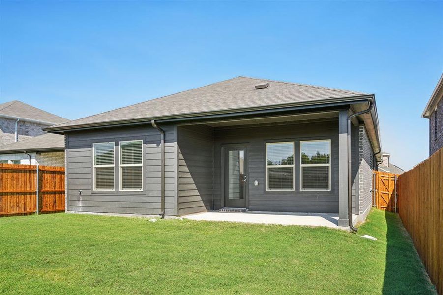 Exterior details and patio area of a home in Simpson Crossing - Spring Series, McKinney (Image 24). Exterior details and patio area of a home in Simpson Crossing - Spring Series, McKinney (Image 24).