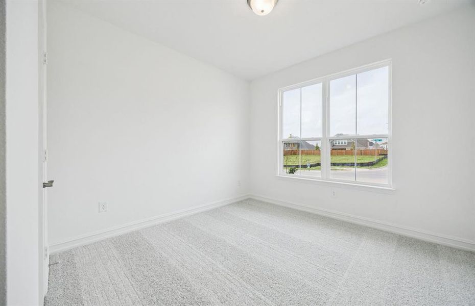 Inviting bedroom offering soft natural light Inviting bedroom offering soft natural light