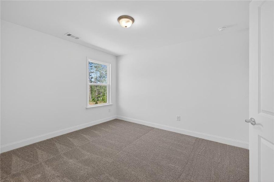Spacious, unfurnished interior of a new home in Riversprings, Dacula (Image 44).