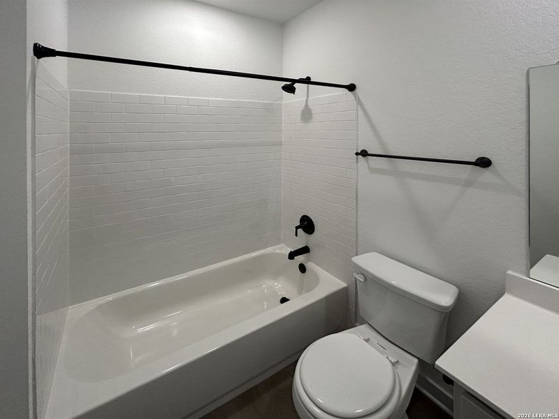 Furnished interior view inside a new home in Hennersby Hollow, San Antonio (Image 9).