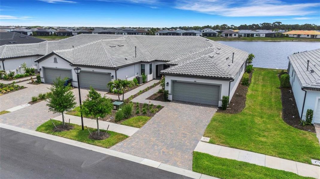 Front exterior of a new home in , Nokomis, FL, highlighting curb appeal (Image 26).