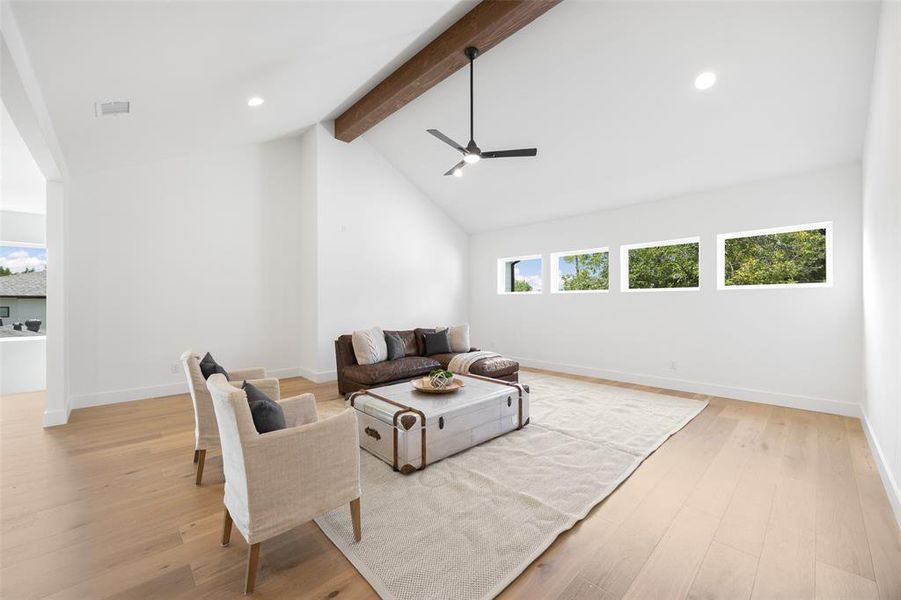 Game area with light wood-type flooring, recessed lighting, and ceiling fan Game area with light wood-type flooring, recessed lighting, and ceiling fan