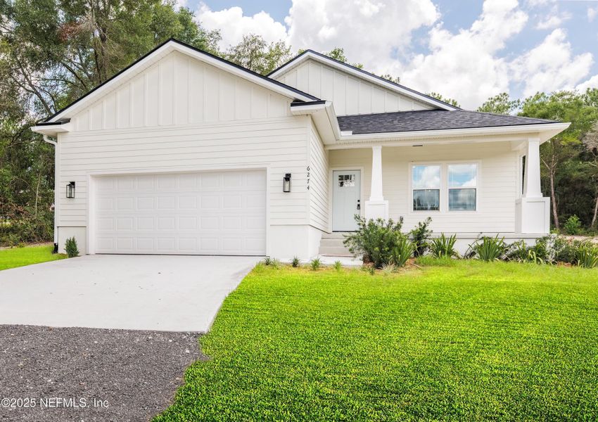 Front exterior of a new home in , Keystone Heights, FL, highlighting curb appeal (Image 1).