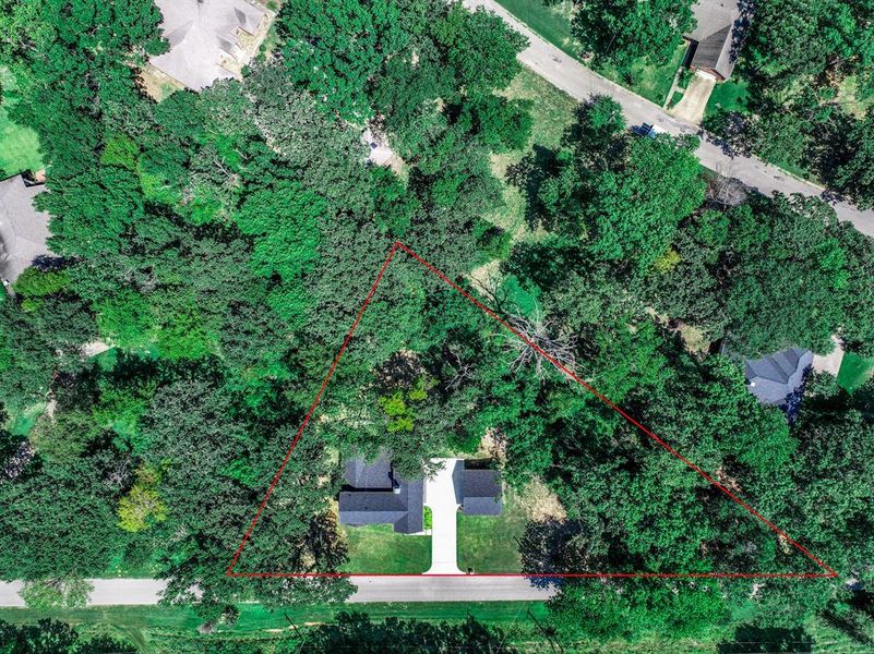 Aerial view of property's location with property boundaries highlighted Aerial view of property's location with property boundaries highlighted