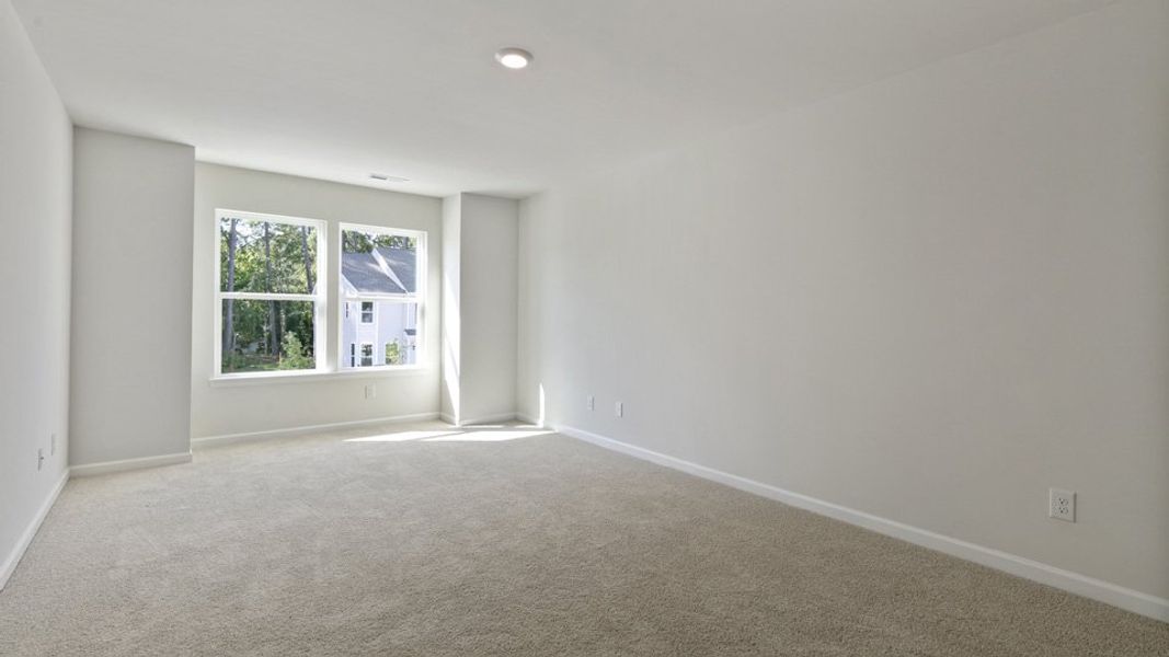 Representative unfurnished interior of a home built from the LANSING - TRADITIONS by D.R. Horton in Chapel Townes, Raleigh (Image 23).