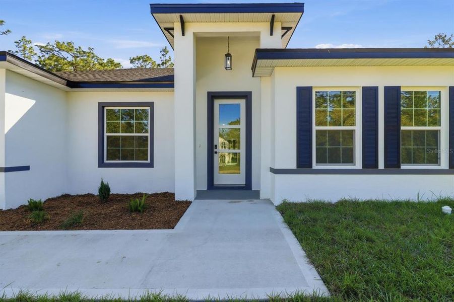 Exterior details and patio area of a home in , Citrus Springs (Image 22).