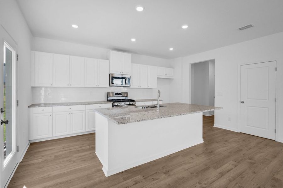 Representative furnished interior of a home built from the Jefferson by Taylor Morrison in Heritage River, Euharlee (Image 7).