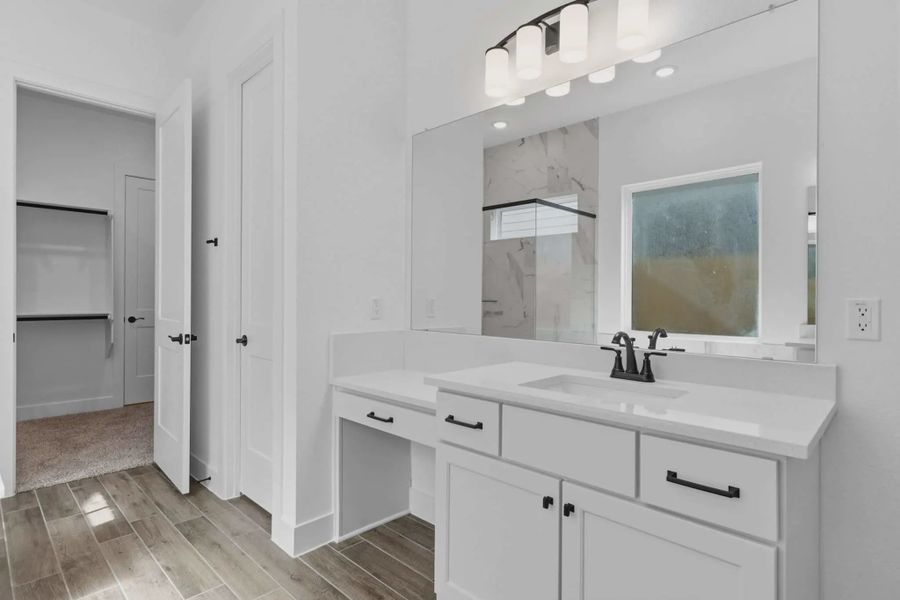 Representative furnished interior of a home built from the Sorenstam by Chesmar Homes in Riceland Alley Loads, Mont Belvieu (Image 18).