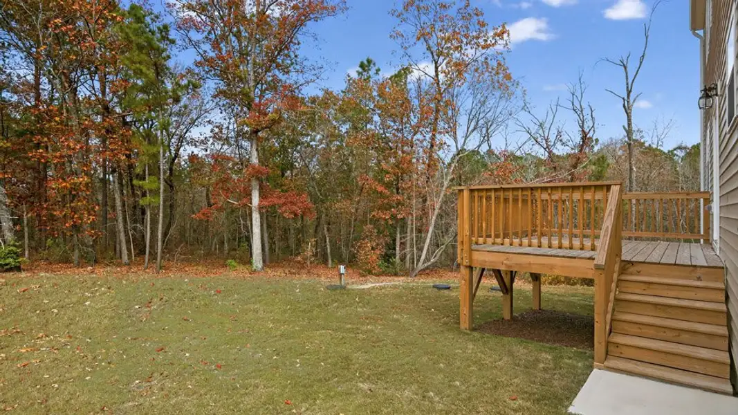 Exterior details and patio area of a home in Mason Ridge, Spring Lake (Image 3).