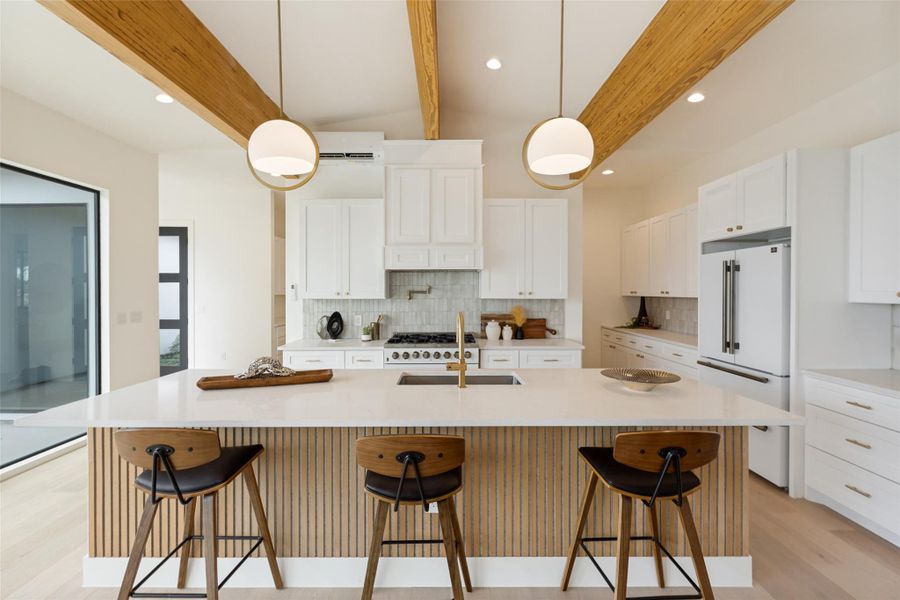 Floor-to-ceiling glass and exposed wooden beams create an airy living space with an expansive outdoor patio.