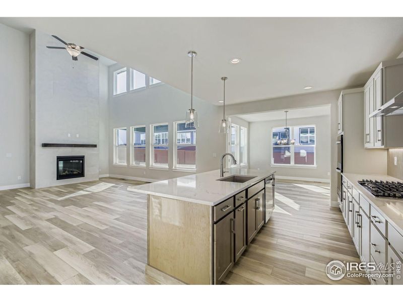 Furnished interior view inside a new home in RainDance National 60/70, Windsor (Image 6).