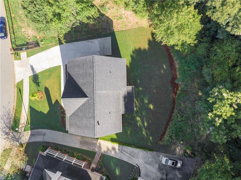 Front exterior of a new home in , Covington, GA, highlighting curb appeal (Image 21).