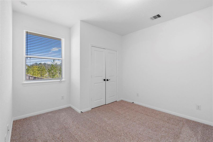 Spacious, unfurnished interior of a new home in Woodforest, Montgomery (Image 15).
