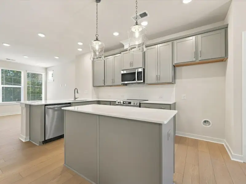 Furnished interior view inside a new home in Central Living at Craig, Charlotte (Image 6).