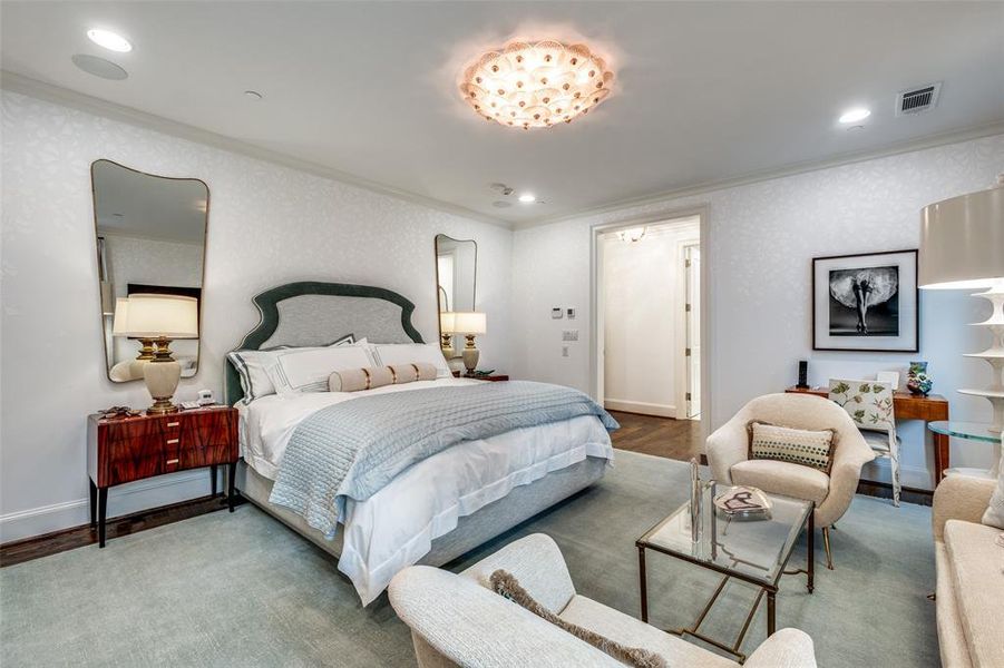 Primary bedroom with vintage chandelier and magnificent European wall covering