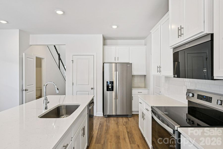 Photo is not of the actual home, but is an inspirational photo of builder’s model home and may depict options, furnishings, and/or decorator features that are not included