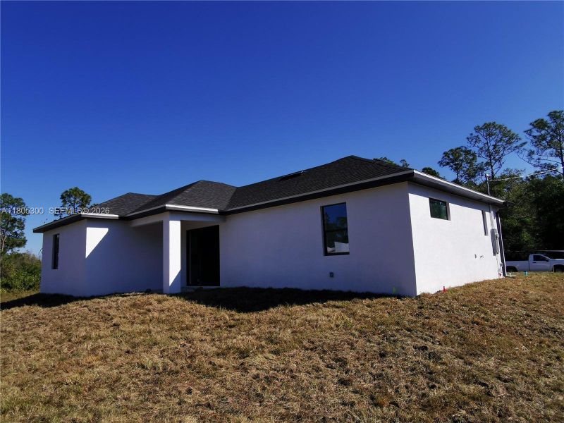 Exterior details and patio area of a home in , Lehigh Acres (Image 24).