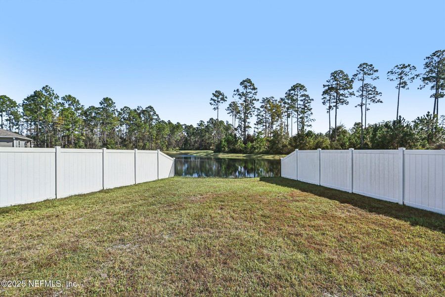 Exterior details and patio area of a home in Village Park, Green Cove Springs (Image 29).