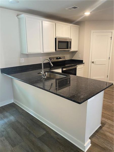 Furnished interior view inside a new home in Twin Oaks, Villa Rica (Image 7).