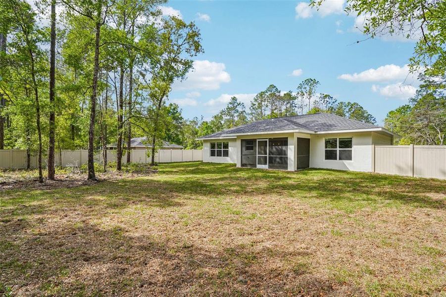 Exterior details and patio area of a home in , Citrus Springs (Image 41).