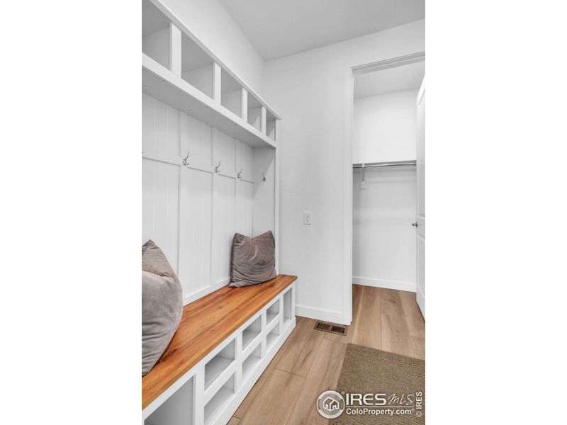 Custom mudroom with built ins and large coat closet Custom mudroom with built ins and large coat closet