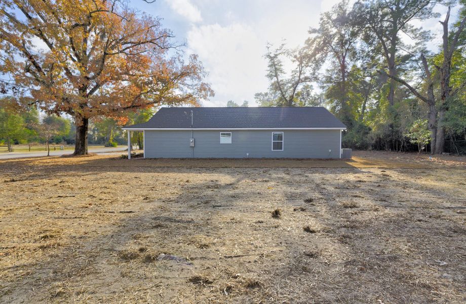 Exterior details and patio area of a home in , Walterboro (Image 26).