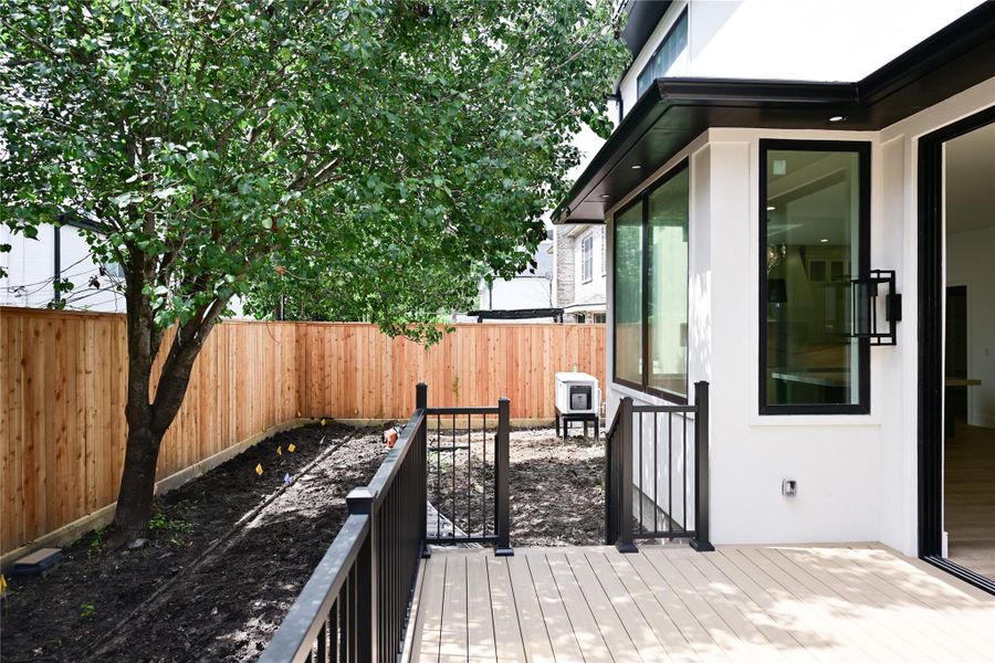 Exterior details and patio area of a home in , Houston (Image 2). Exterior details and patio area of a home in , Houston (Image 2).
