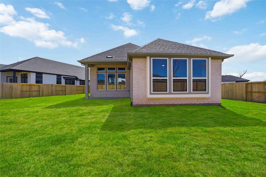Exterior details and patio area of a home in Sienna, Missouri City (Image 3). Exterior details and patio area of a home in Sienna, Missouri City (Image 3).