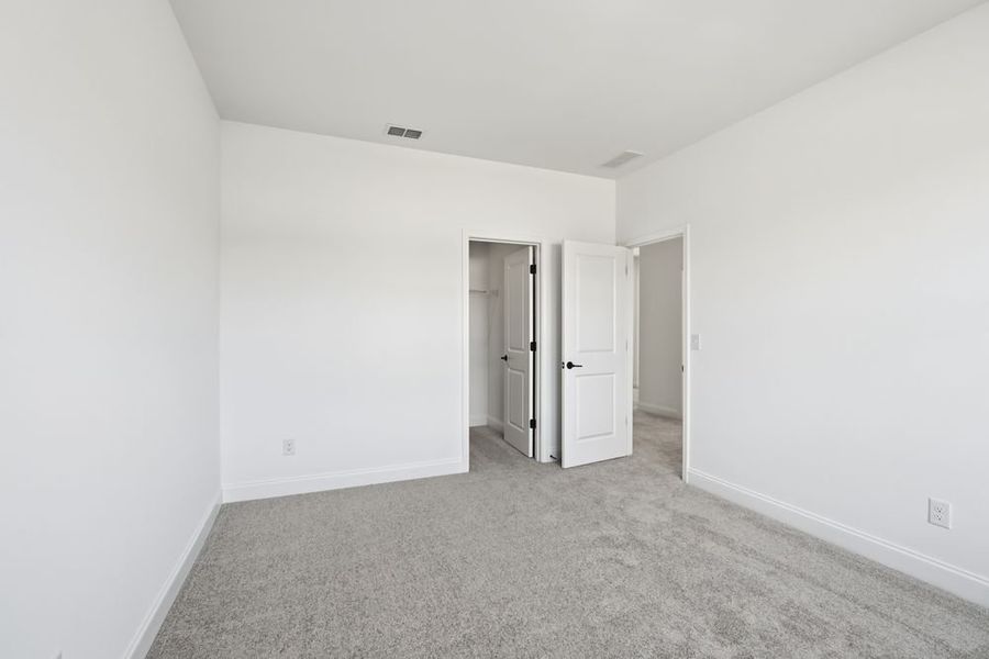 Representative unfurnished interior of a home built from the Stockbridge by Taylor Morrison in Watson Park, Snellville (Image 37).