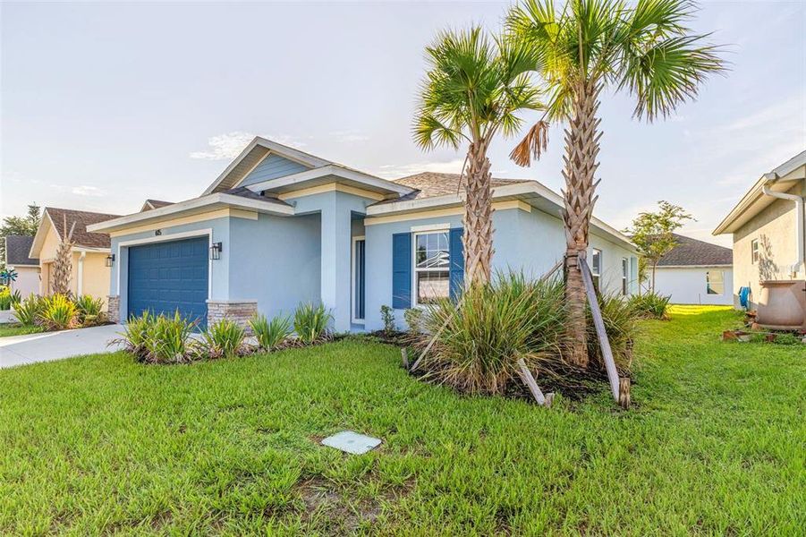 Front exterior of a new home in , Port Charlotte, FL, highlighting curb appeal (Image 21).